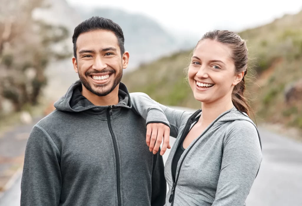 couple fitness and portrait with smile in road fo utc