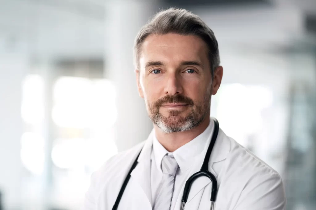 mature doctor portrait and man in hospital for he utc
