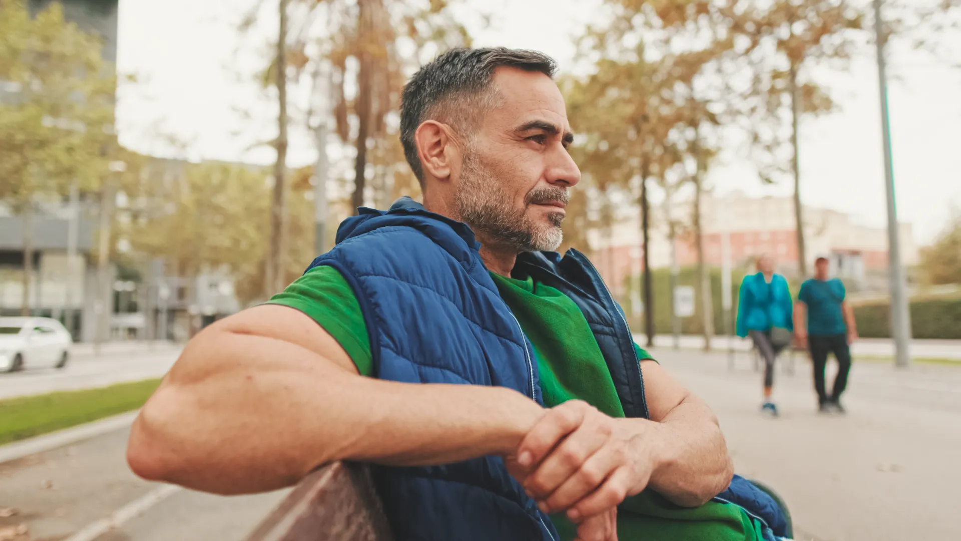 mature man while sitting on park bench bottom vi utc